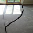 a huge crack in a concrete slab floor in Charlotte