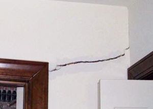 A large drywall crack in an interior wall in Concord
