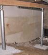 A system of crawl space support posts adding structural support to a crawl space in Sumter