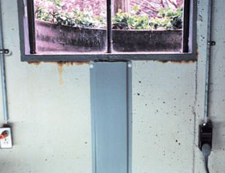 Repaired waterproofed basement window leak in Greer
