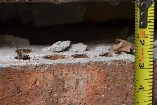 An almost 3 inch gap in the foundation of this home