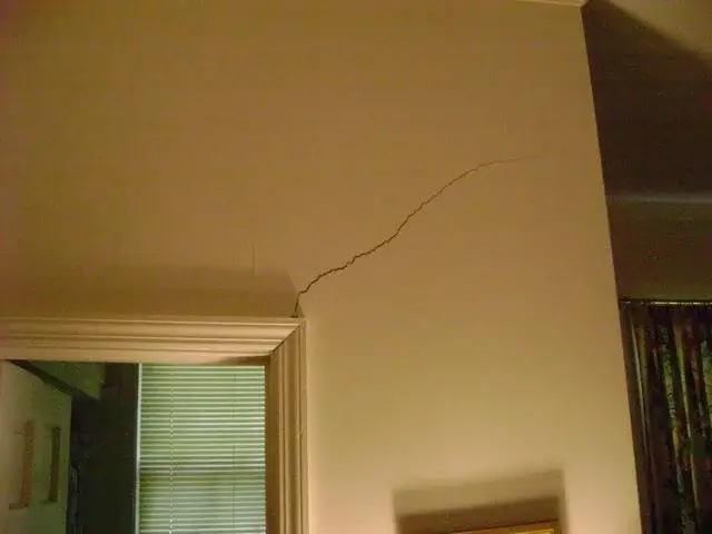 This wall crack is evidence of a foundation problem. We installed our crawl space SmartJacks to stabilize the foundation and seal the wall crack.