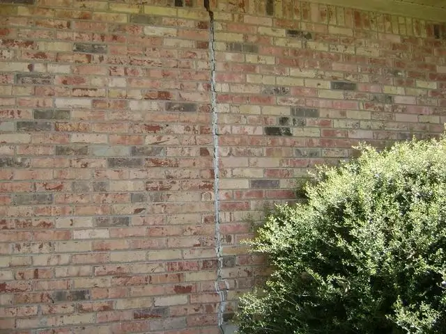 These walls had several large cracks, but our push piers sealed these right up.