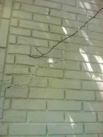 This crack is already sealing up nicely after installing foundation push piers in this Conway, SC home.