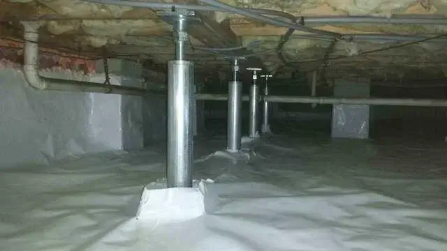 A look at the crawl space encapsulation and SmartJack installation.