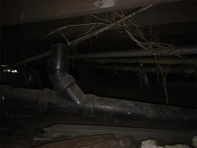 A "Before" picture of the crawlspace.