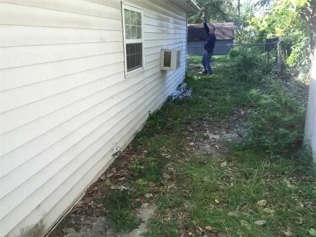 The guest house before trenching around the exterior.