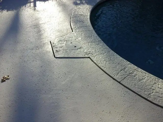 The pool deck was settling below the pool's frame.