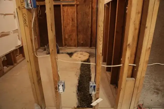 Sump pump installed in concrete