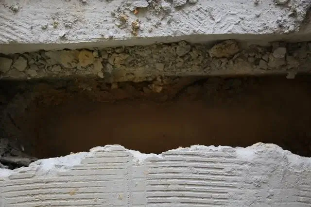 It had not rained in two or three days, but Kevin's water table was still so high that it was seeping through his concrete slab foundation.