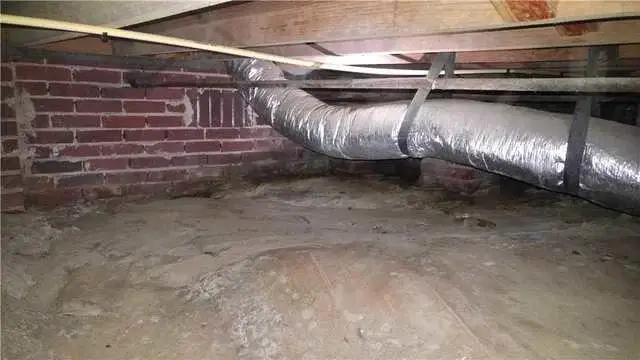 Customer John S. has a fairly clean crawl space, but has drainage issues between the partial basement and partial crawl space during the rainy season.