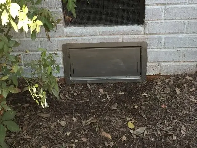 Smartvent installation on the right side of Freddy's house. You can see by looking at it that it would be hard for an animal to get into the home because the vent is sealed off.