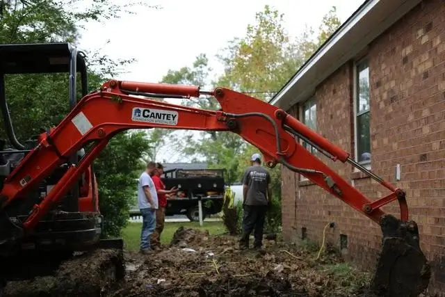 Robert talks about how the helical piers are getting installed.